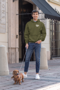 mockup-of-a-man-wearing-a-pullover-hoodie-while-walking-his-dog-30686