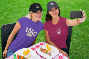 mockup-of-two-female-friends-wearing-customizable-t-shirts-and-dad-hats-29710